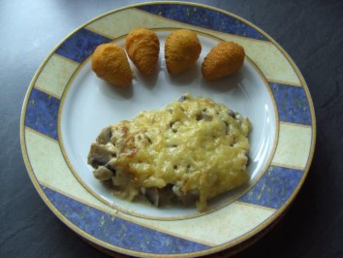 Schweinefilet mit Champignon-Käse überbacken - Rezept