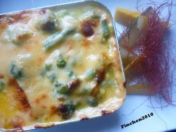 Lachs-Gemüseschiffchen mit Ingwer-Käse überbacken - Rezept