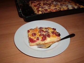 Rezept: Kirschkuchen mit Schmandguss Kirschkuchen mit Schmandguss - Rezept