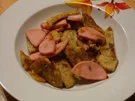 G'röstl aus Semmelknödeln, Wurst und Zwiebeln - Rezept