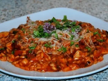 Rezept: Tomatiges Meeresfrüchte-Risotto Tomatiges Meeresfrüchte-Risotto - Rezept