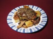 Lammrücken in Vollkornkruste auf Rosinen-Spitzkohl & Kräuterseitlingen - Rezept