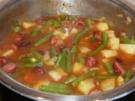 Eintopf: Bohnen, Kartoffeln, Tomaten und Schinkenknacker - Rezept