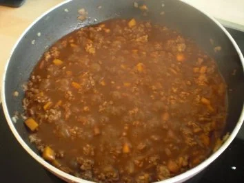 Ravioli aus Rotweinrind auf Amaretto-Kürbis-Püree mit Birnen-Sambal - Rezept - Bild Nr. 4