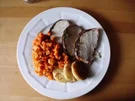 Schweinerücken mit Kräutern in Baconmantel - Rezept