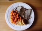 Schweinerücken mit Kräutern in Baconmantel - Rezept