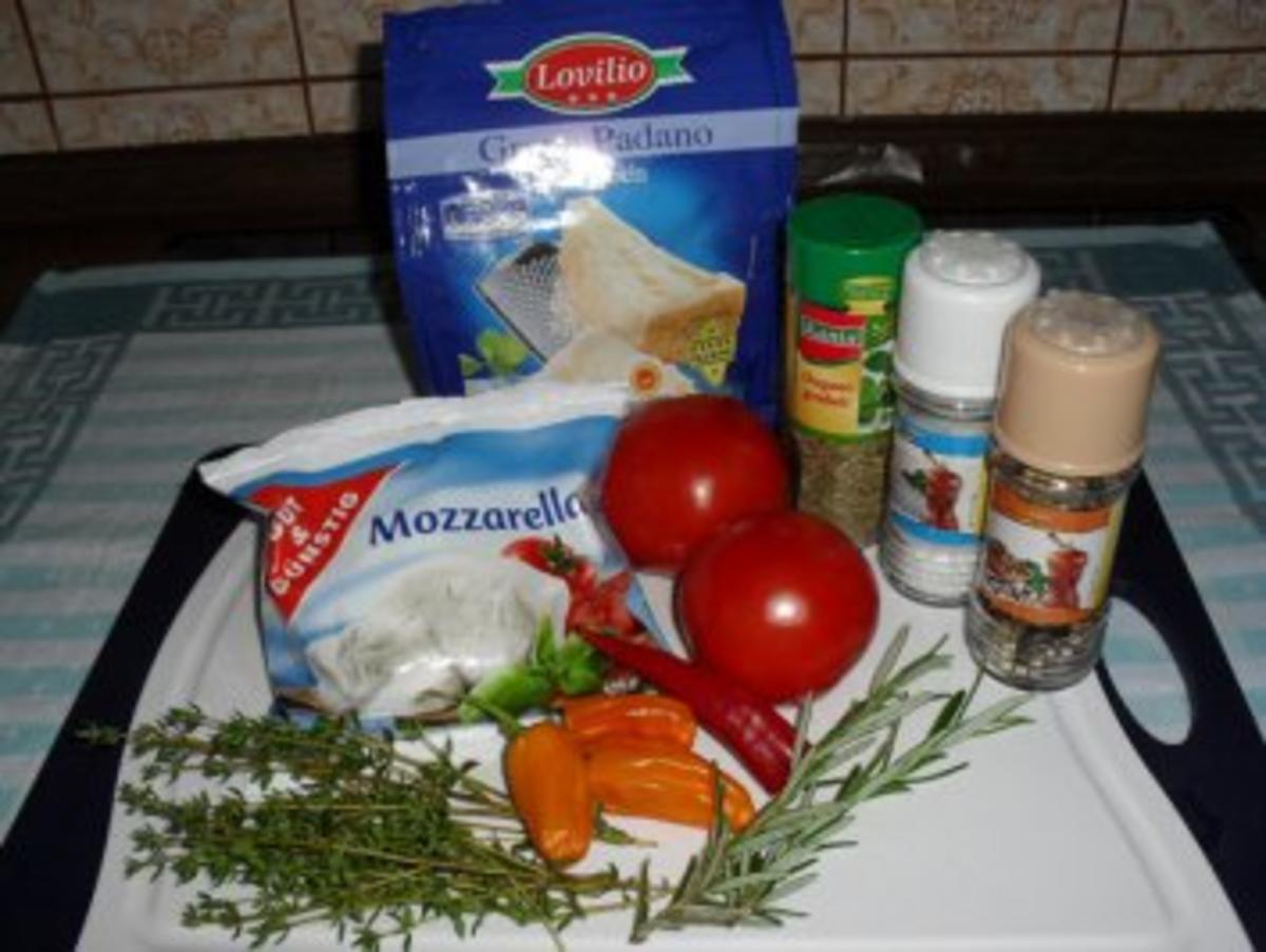 Polenta mit Tomaten, Mozarella, Kräutern und Parmesankäse - Rezept - Bild Nr. 2