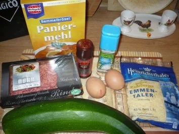 Gefüllte Zucchini mit Käse überbacken - Rezept