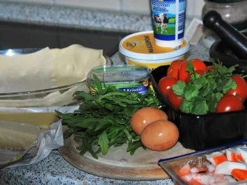 Rezept: Tomaten-Rucola-Tarte mit Meeresfrüchten Bild Nr. 2 Tomaten-Rucola-Tarte mit Meeresfrüchten - Rezept - Bild Nr. 2