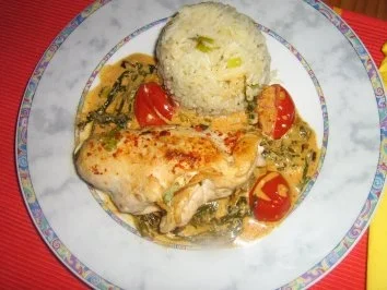 Hähnchenbrustfilet gefüllt auf Rucola-Tomatensauce an Basmatireis - Rezept