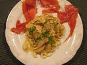 Steinpilze mit Sahnetagliatelle und Parmaschinken - Rezept