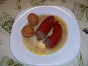 Gefüllte Spitzpaprika mit Tomatenreisbällchen - Rezept