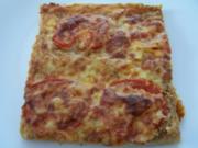 Pizza mit Hackfleisch und Tomaten - Rezept