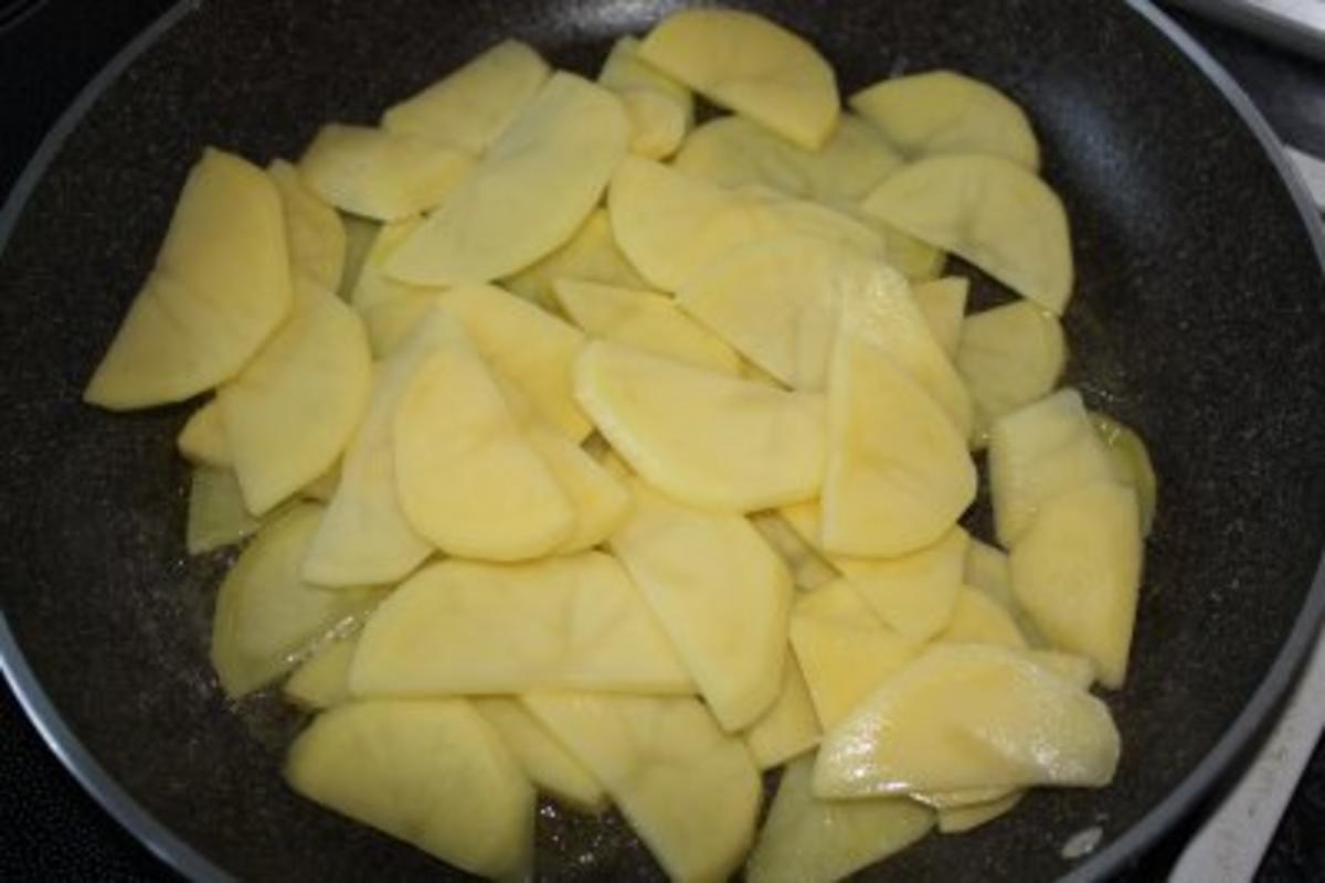 Knusprige Entenbrust mit Knoblauch-Bratkartoffeln und Orangenmöhren - Rezept - Bild Nr. 12