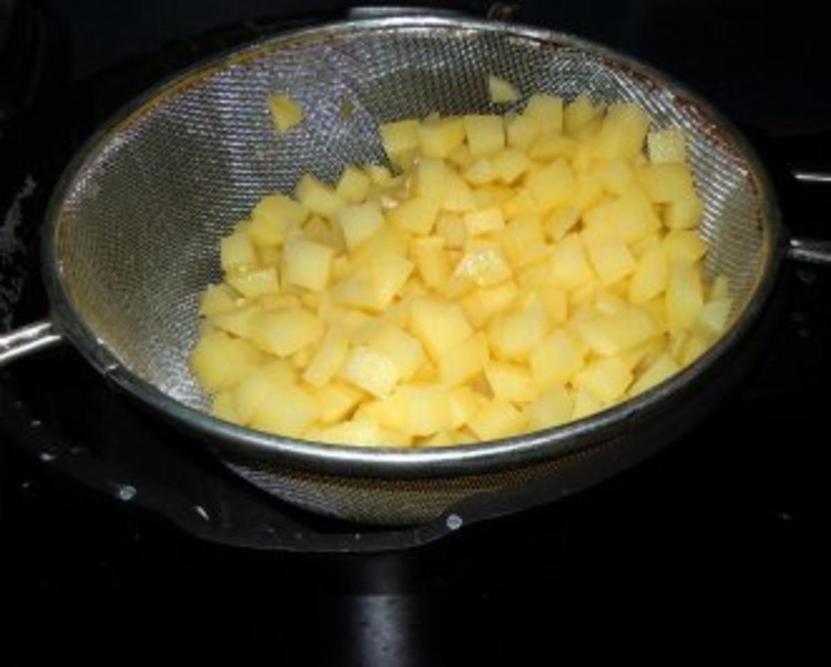 Weißwurst im Sesam-Mantel mit Sesamkartoffeln und Zuckerschoten - Rezept - Bild Nr. 2
