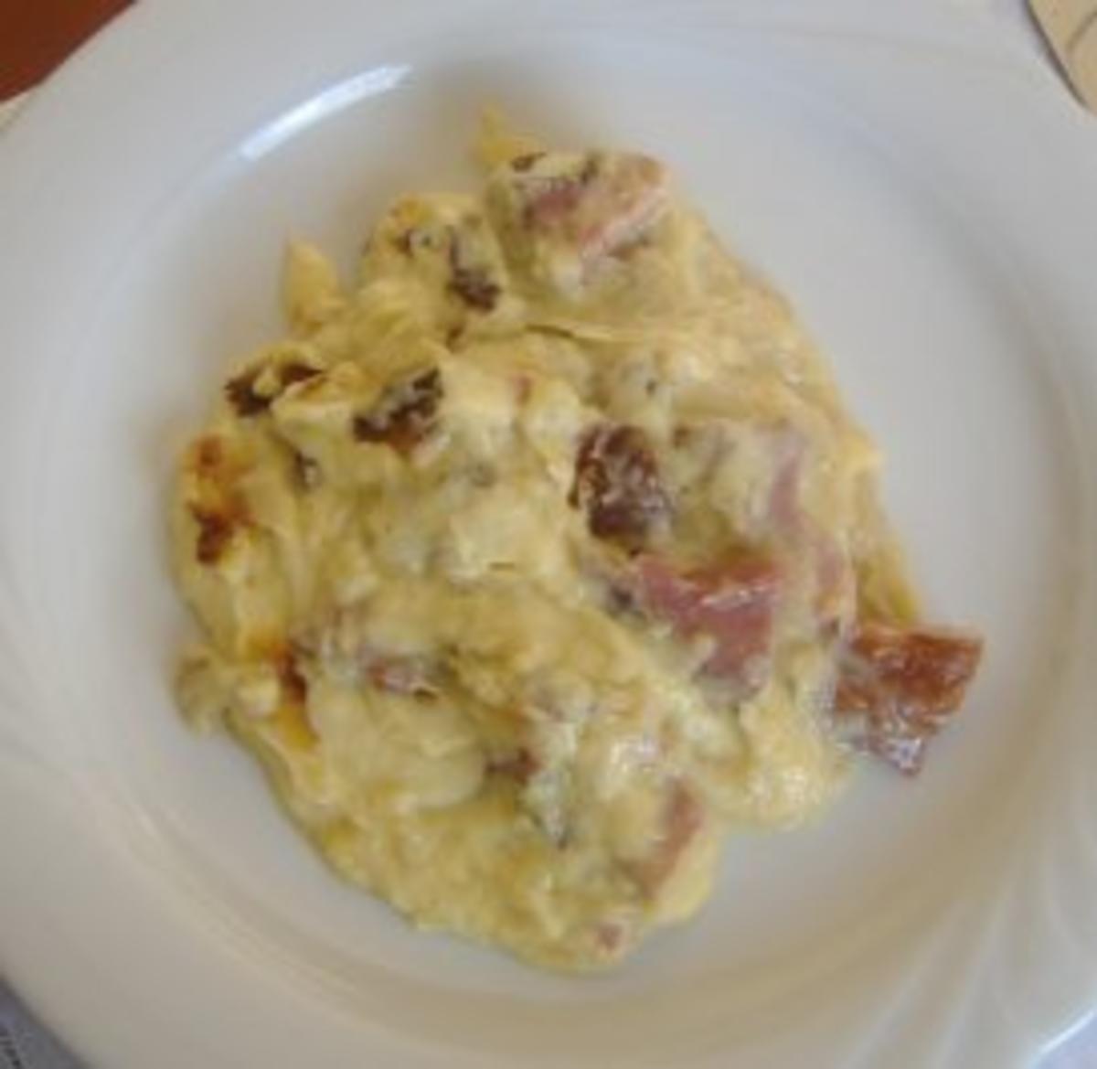 Badisches Schäufele mit Sauerkraut und Kartoffelsauce überbacken - Rezept