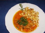 Schweinshaxenscheiben mit Gemüse geschmort - Rezept