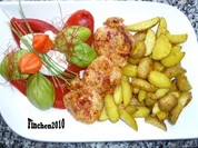 Limetten-Kartoffeln an Schweinefilet mit Röstpaprika und Ziegenkäsenocken - Rezept