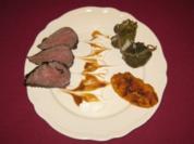 Rinderfilet in Tee mariniert mit Reis im Weinblatt und Karotten-Köfte - Rezept