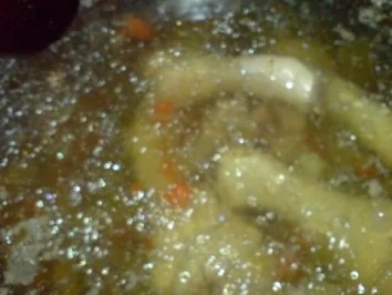Rezept: Nudelsuppe mit Hähnchenfleisch und Mägen Bild Nr. 11 Nudelsuppe mit Hähnchenfleisch und Mägen - Rezept - Bild Nr. 11