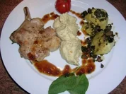 Iberico Schweine-Kotelett mit Kartoffel-Mandel-Püree und Artischocken - Rezept