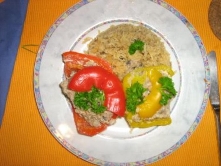 Gefüllte Paprika mit Putenhack, Champignons und Reis - Rezept - kochbar.de