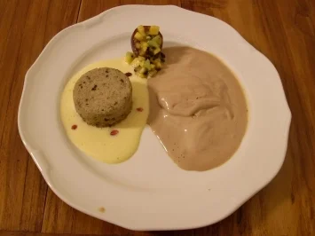 Bananenauflauf auf Ananas mit exotischen Früchten und Schokolade-Rum-Eis - Rezept