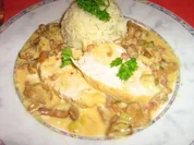 Putenbrust in einer Pfifferlingrahmsoße mit Pfiff - Rezept