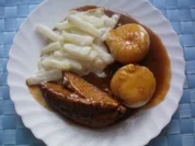 Geschmorte Putenkeule mit Sahnekohlrabi - Rezept