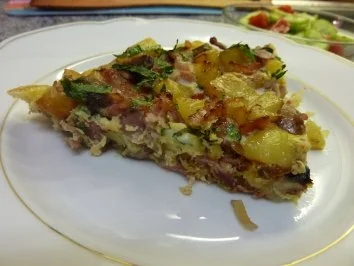 Kartoffel-Tortillia mit Speck und Champignons - Rezept