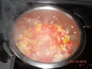 Rezept: Backhähnchen mit Djuvec-Reis Bild Nr. 6 Backhähnchen mit Djuvec-Reis - Rezept - Bild Nr. 6