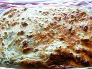 Kartoffelgratin mit Kräuterquarkhaube zu Chinakohl - Rezept