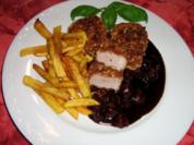 Schweinemedaillons im Haselnussmantel an Sauerkirsch-Schokosoße - Rezept