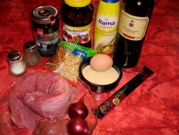 Rezept: Schweinemedaillons im Haselnussmantel an Sauerkirsch-Schokosoße Bild Nr. 2 Schweinemedaillons im Haselnussmantel an Sauerkirsch-Schokosoße - Rezept - Bild Nr. 2