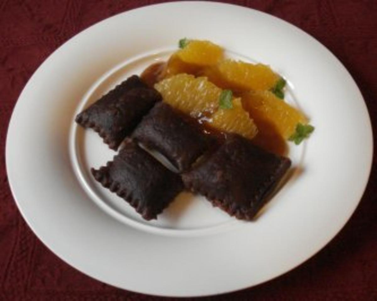 Schokoladen - Nougat - Ravioli an Orangensoße - Rezept
