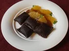 Schokoladen - Nougat - Ravioli an Orangensoße - Rezept
