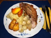 Schweinerippe dick, geschmort mit Äpfeln und Zwiebeln - Rezept