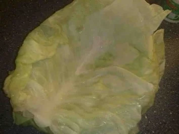 Rezept: Kohlrolladen mit Reis-Hack Füllung in Tomatensauce / Keine STERNEN vergeben bitte!!! Bild Nr. 3 Kohlrolladen mit Reis-Hack Füllung in Tomatensauce / Keine STERNEN vergeben bitte!!! - Rezept - Bild Nr. 3