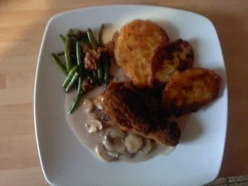 Rezept: Panierte Hähnchenkeule mit Kartoffelpuffer und Speckbohnen Bild Nr. 3 Panierte Hähnchenkeule mit Kartoffelpuffer und Speckbohnen - Rezept - Bild Nr. 3