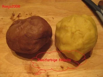 Weihnachtsplätzchen- Zweifarbige Nüsslis - Rezept - Bild Nr. 2