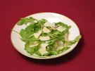 Rucola in Vinaigrette mit Birne und Parmesan - Rezept