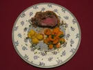 Filet Wellington an Sauce Perigord, Herzoginkartoffeln und glasierten Möhrchen - Rezept