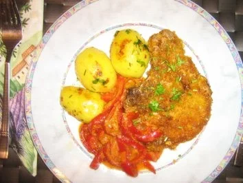 Rezept: Kotelett im Krustenmantel mit Zigeunersoße Kotelett im Krustenmantel mit Zigeunersoße - Rezept