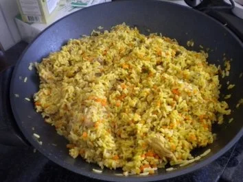 Gemüsereis mit Schweinsteakstreifen und Salat - Rezept - Bild Nr. 2