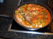 Coniglio alle olive verdi - Rezept
