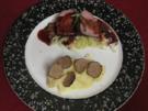 Pochiertes Kalbsfilet mit Sahnespitzkohl und Rotwein-Jus - Rezept