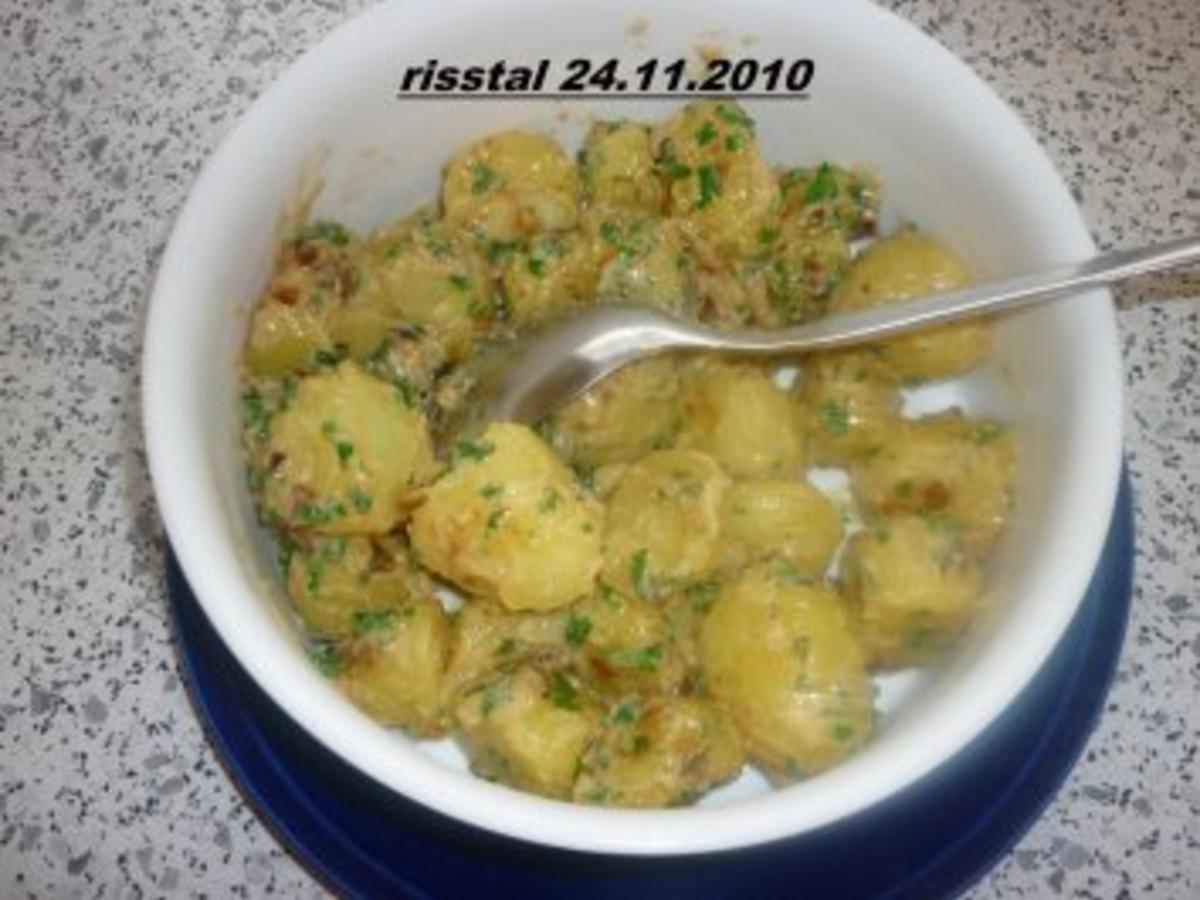 Sahnekartoffeln mit kleine Kartoffeln -festkochend- und Butter oder ...