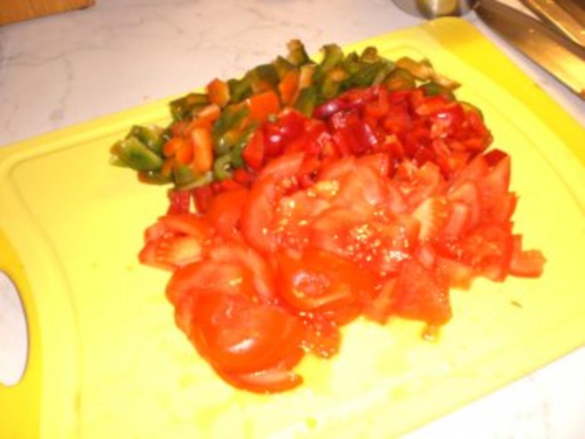 Gefülltes Heilbuttfilet mit parnierten Bratkartoffeln und Paprika-Tomatengemüse - Rezept - Bild Nr. 6
