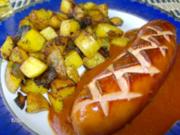 Currywurst mit pikanter Soße - an Bratkartoffelwürfel - Rezept