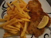 Schnitzel in Kräuterpanade - Rezept